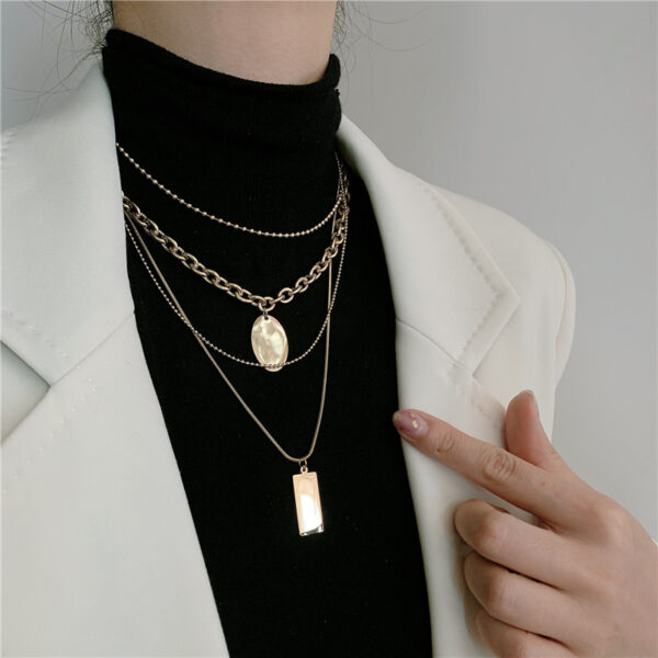 4 LAYERS GOLD NECKLACE - Image 4