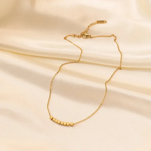 BEADED GOLD NECKLACE